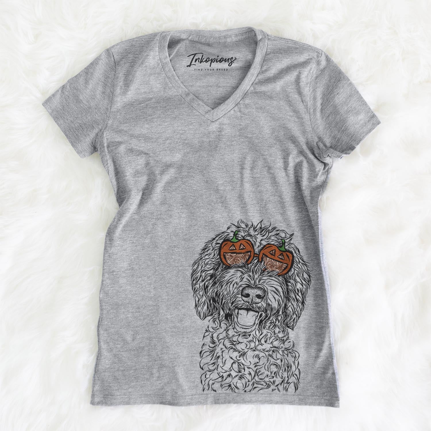 Hand-drawn sketch of Jack the Chocolate Labradoodle wearing pumpkin glasses on a Jack Doodle pumpkin collection, on a hanger