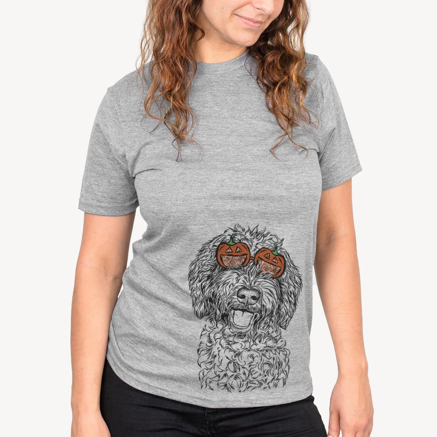 Hand-drawn sketch of Jack the Chocolate Labradoodle wearing pumpkin glasses on a Jack Doodle pumpkin collection, on a hanger