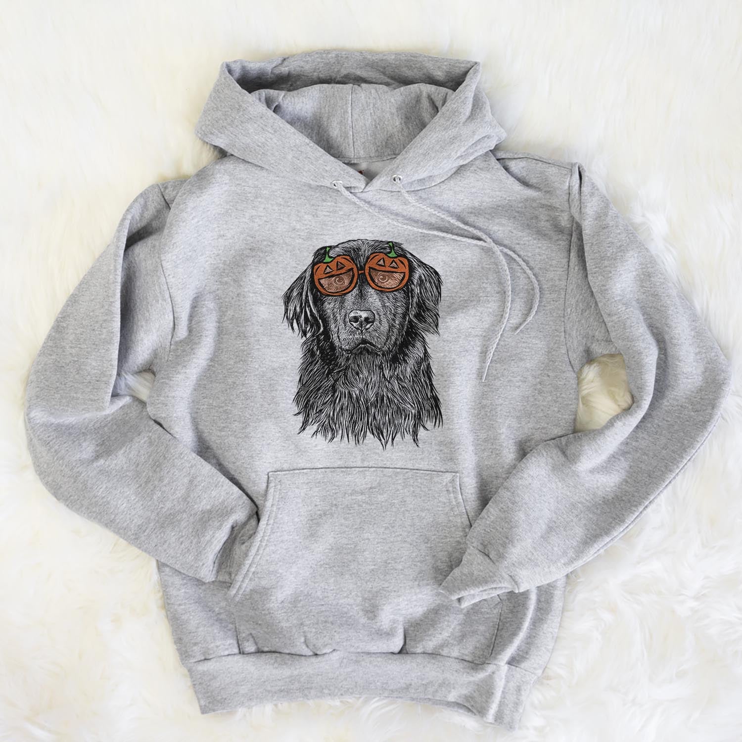 Hand-drawn sketch of Jinx the Newfoundland wearing pumpkin glasses on a Grey pumpkin collection, flat lay