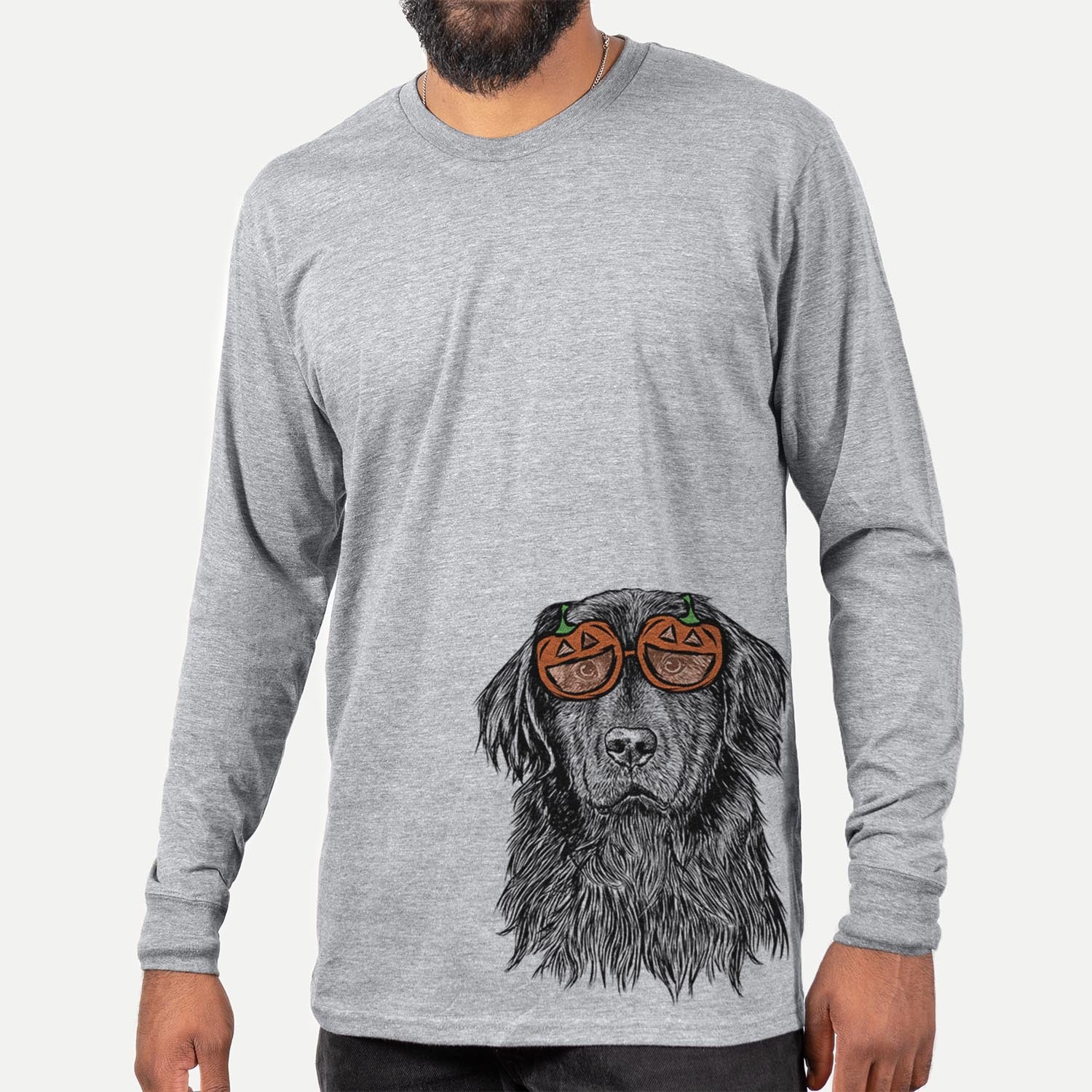 Hand-drawn sketch of Jinx the Newfoundland wearing pumpkin glasses on a Grey pumpkin collection, hanging on a wall