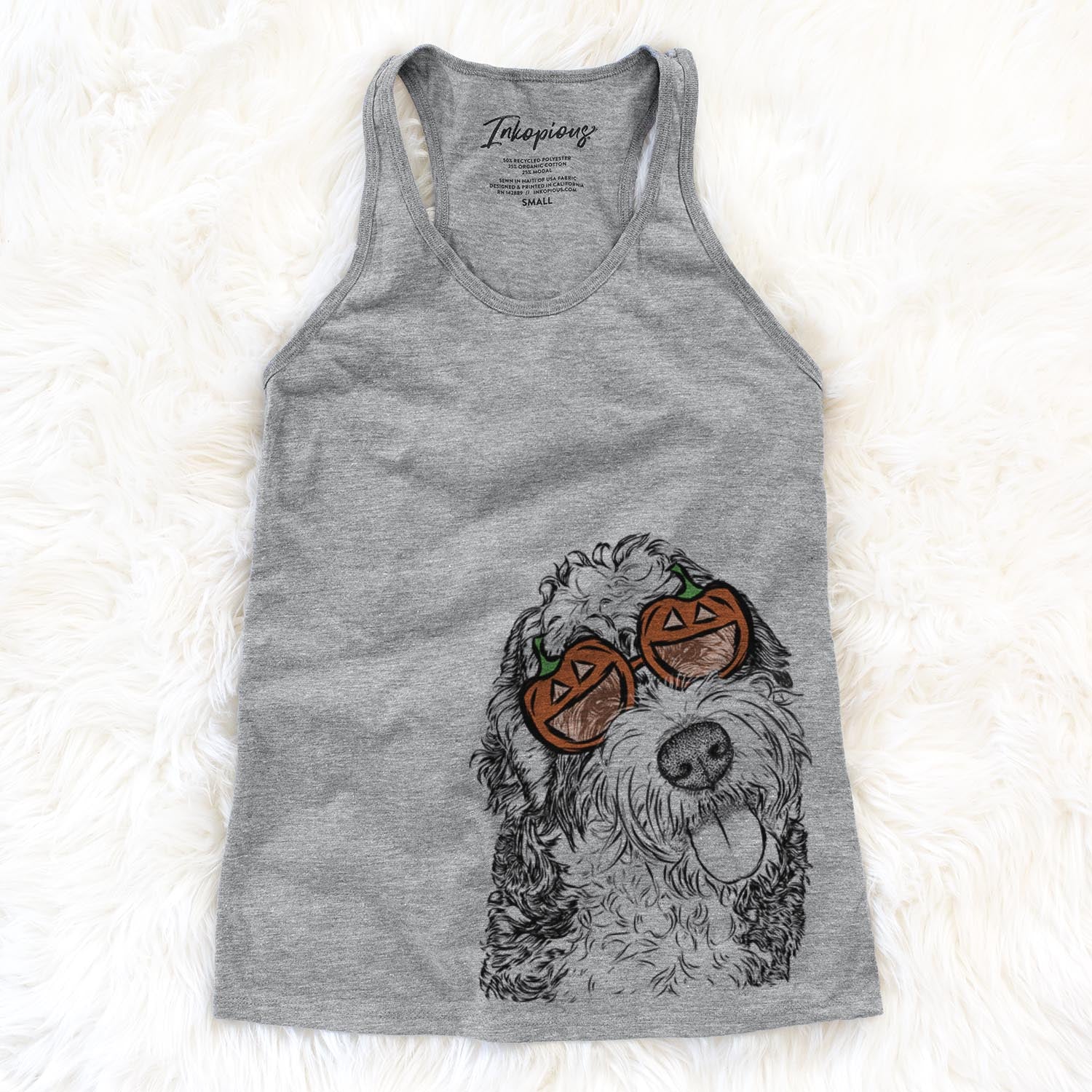 Hand-drawn sketch of Kaci the Bernedoodle wearing pumpkin glasses on a Grey pumpkin collection