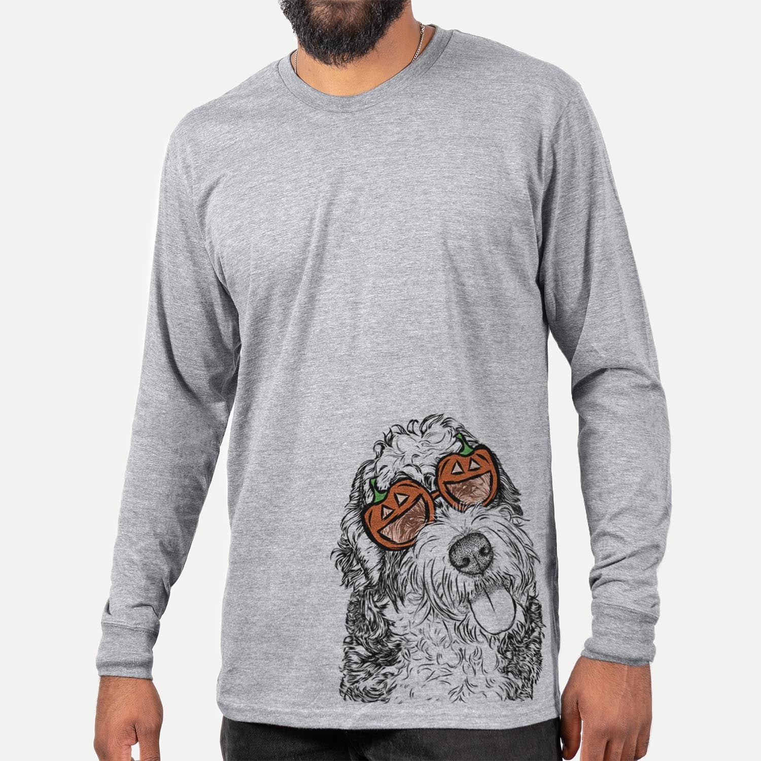 Hand-drawn sketch of Kaci the Bernedoodle wearing pumpkin glasses on a Grey pumpkin collection, hanging on a wall
