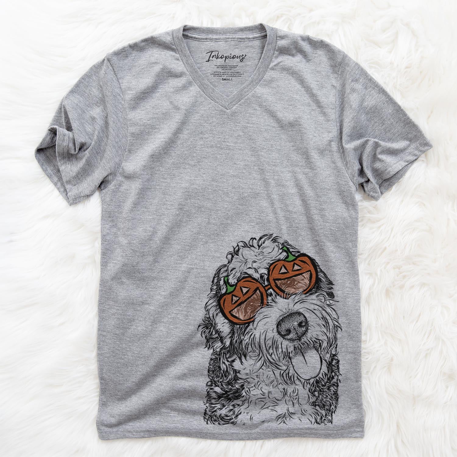 Hand-drawn sketch of Kaci the Bernedoodle wearing pumpkin glasses on a Grey pumpkin collection