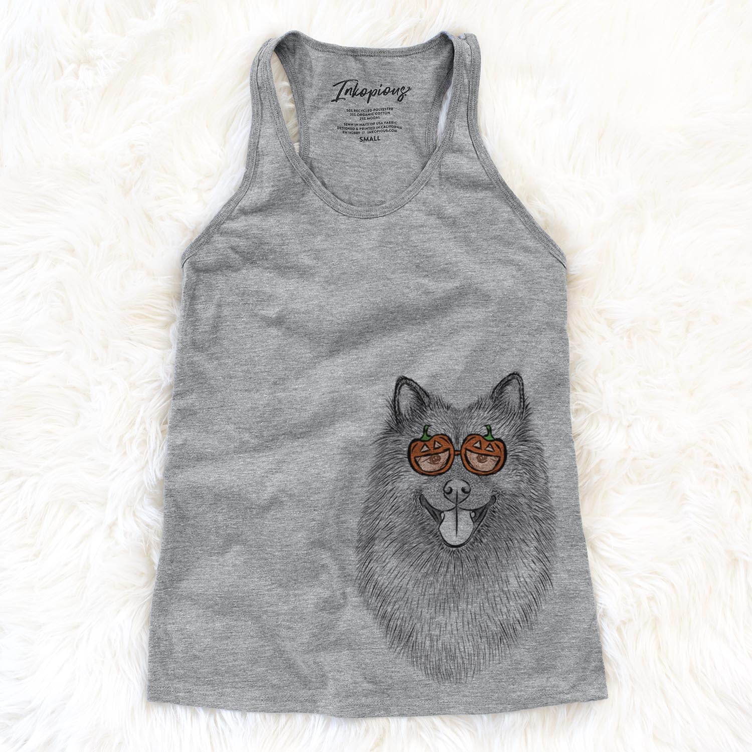 Hand-drawn sketch of Kai the Keeshond wearing pumpkin glasses on a Grey pumpkin collection