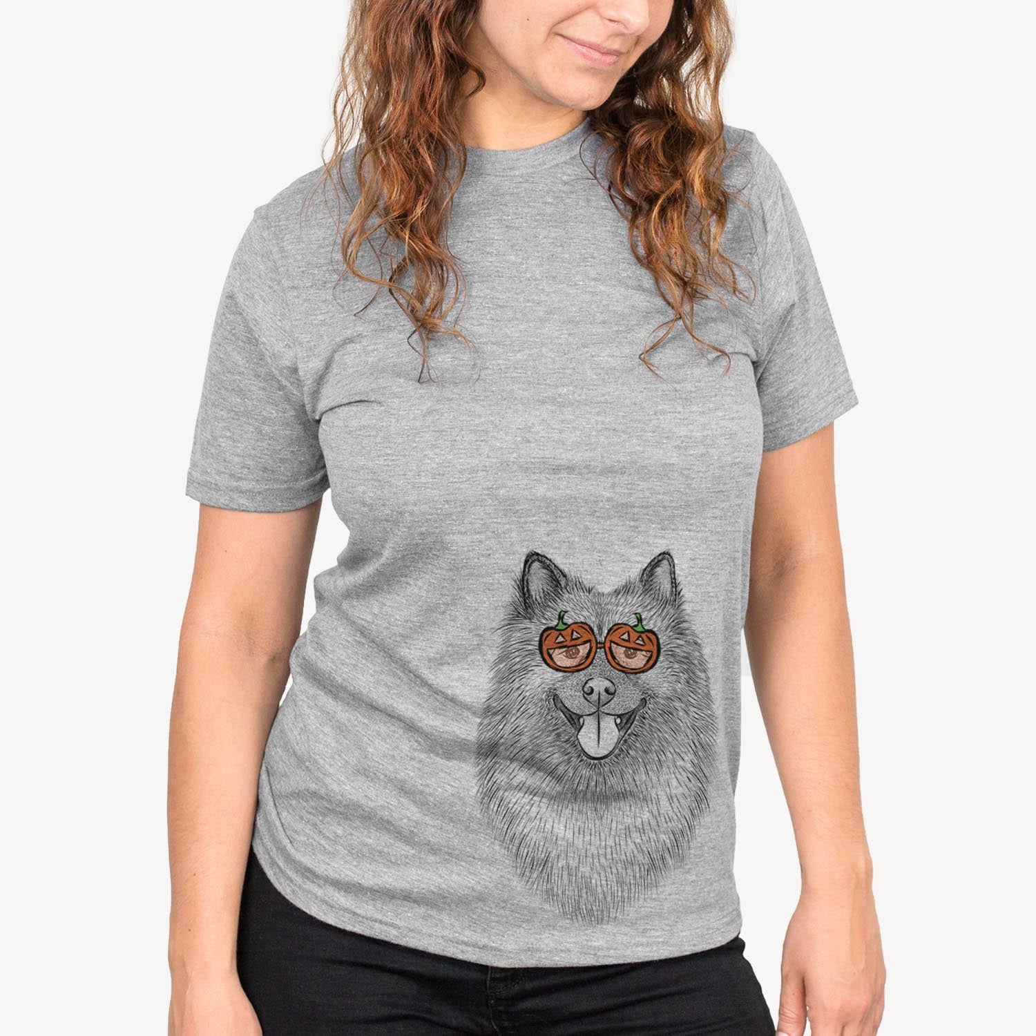 Hand-drawn sketch of Kai the Keeshond wearing pumpkin glasses on a Grey pumpkin collection, on a hanger