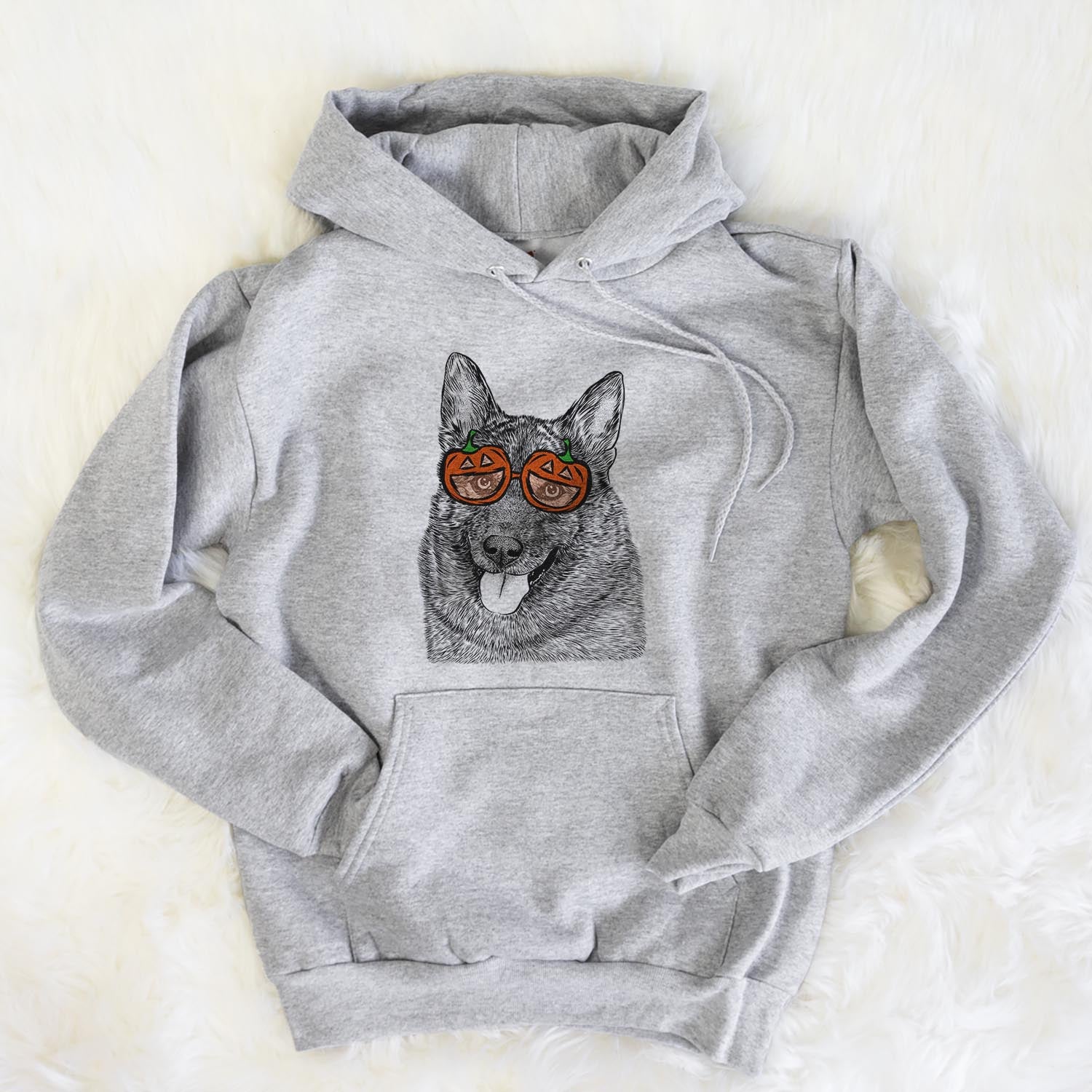 Hand-drawn sketch of Kasia the Norwegian Elkhound wearing pumpkin glasses on a Grey pumpkin collection, flat lay