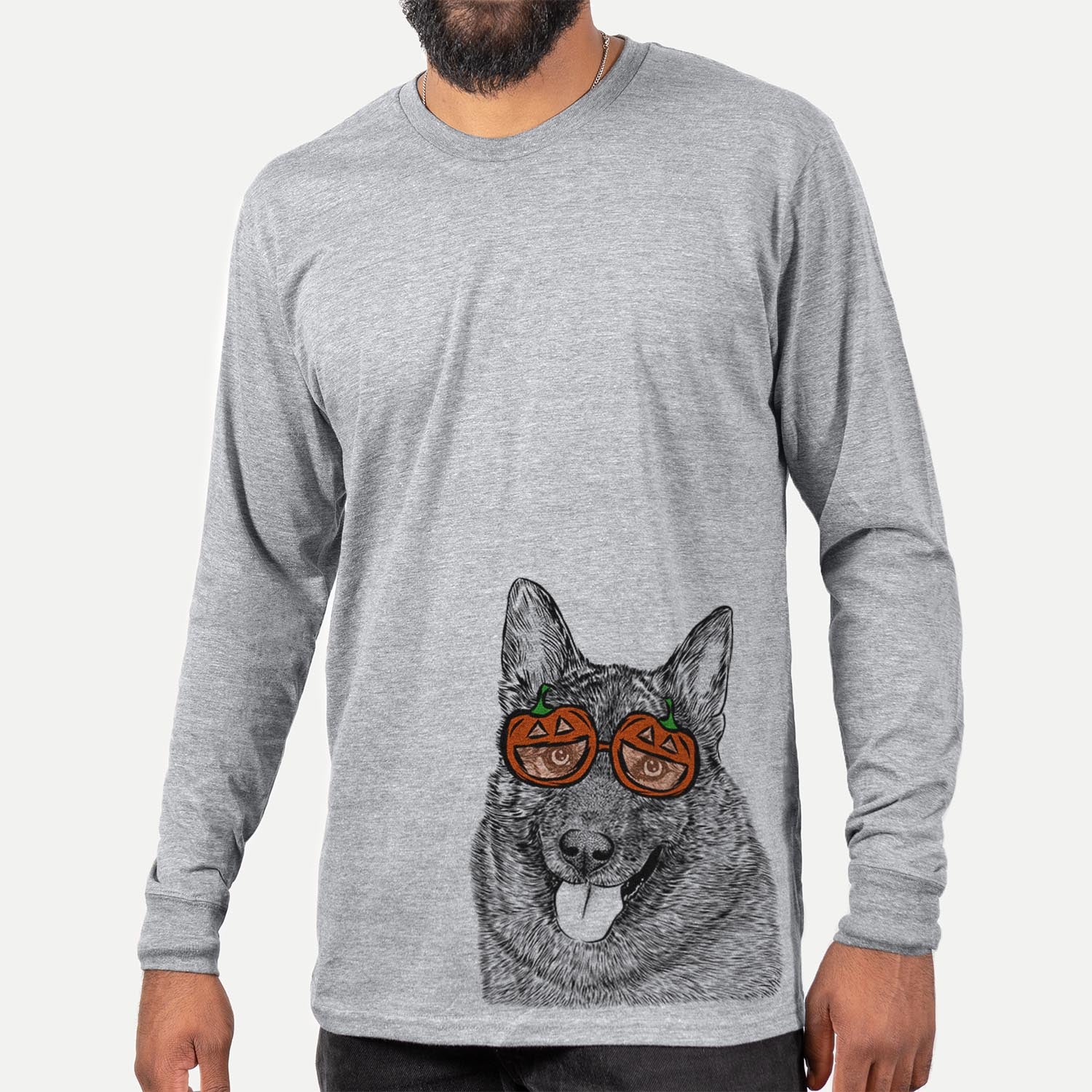 Hand-drawn sketch of Kasia the Norwegian Elkhound wearing pumpkin glasses on a Grey pumpkin collection, hanging on a wall