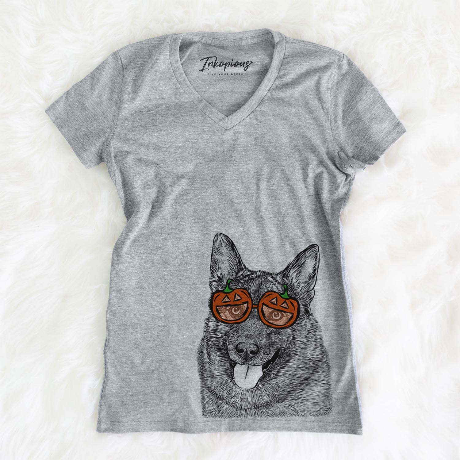 Hand-drawn sketch of Kasia the Norwegian Elkhound wearing pumpkin glasses on a Grey pumpkin collection, on a hanger