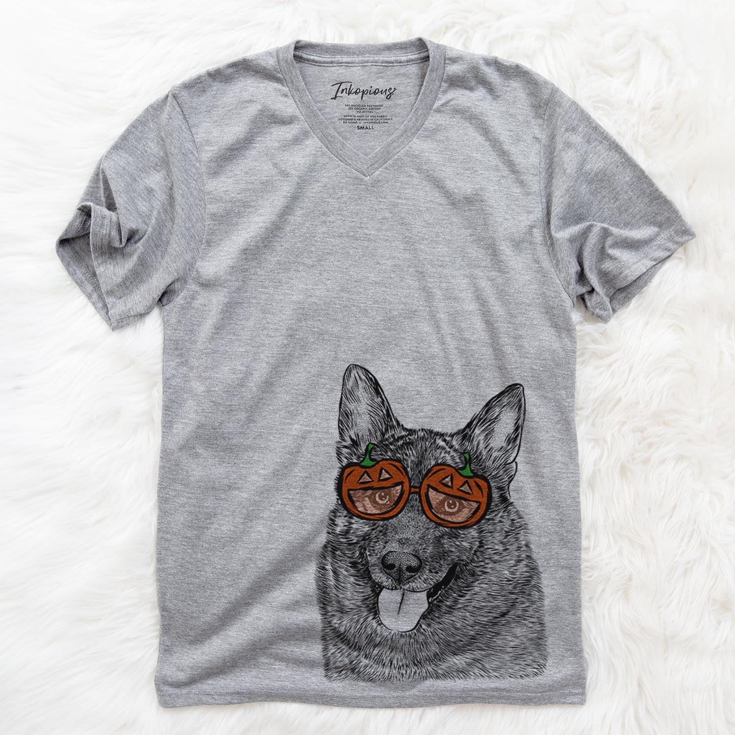 Hand-drawn sketch of Kasia the Norwegian Elkhound wearing pumpkin glasses on a Grey pumpkin collection