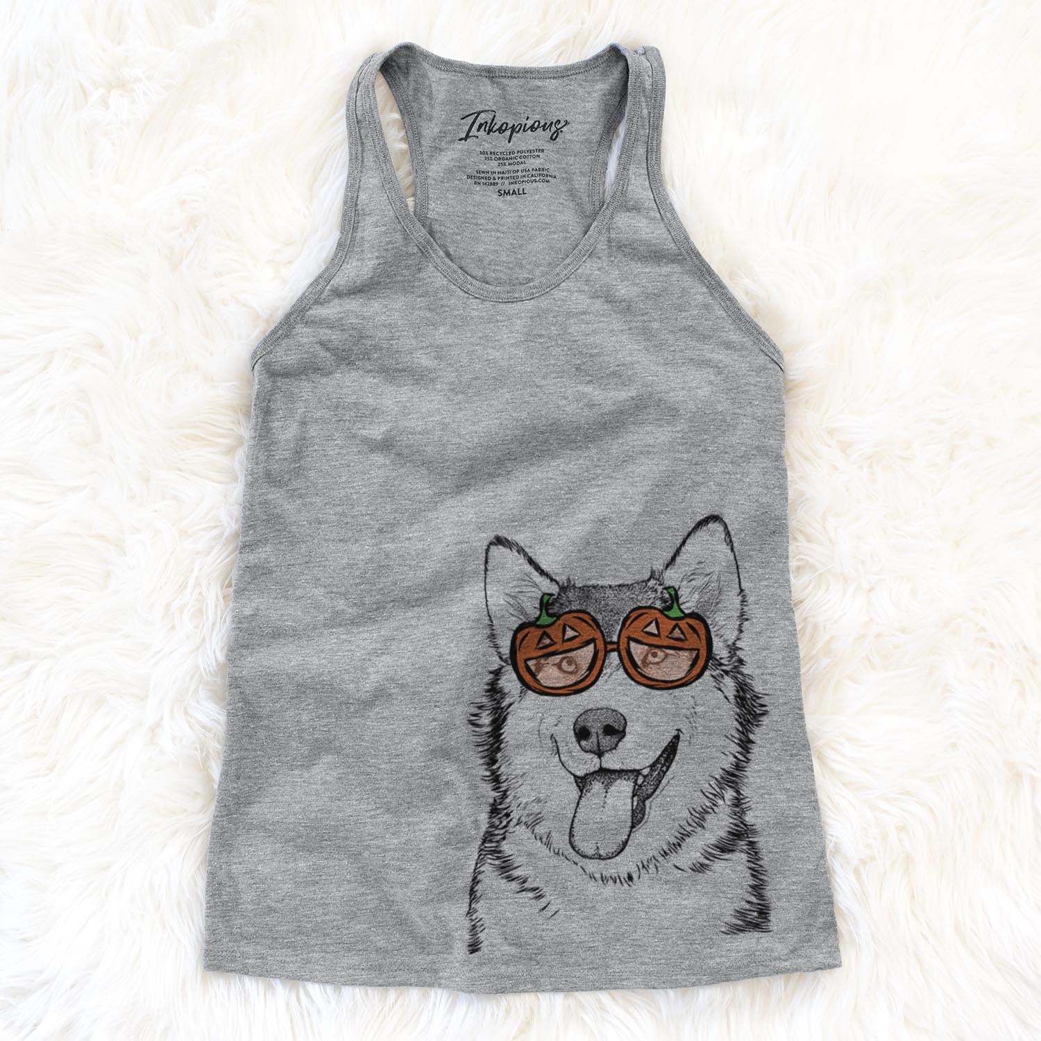 Hand-drawn sketch of Kaskae the Malamute wearing pumpkin glasses on a Grey pumpkin collection