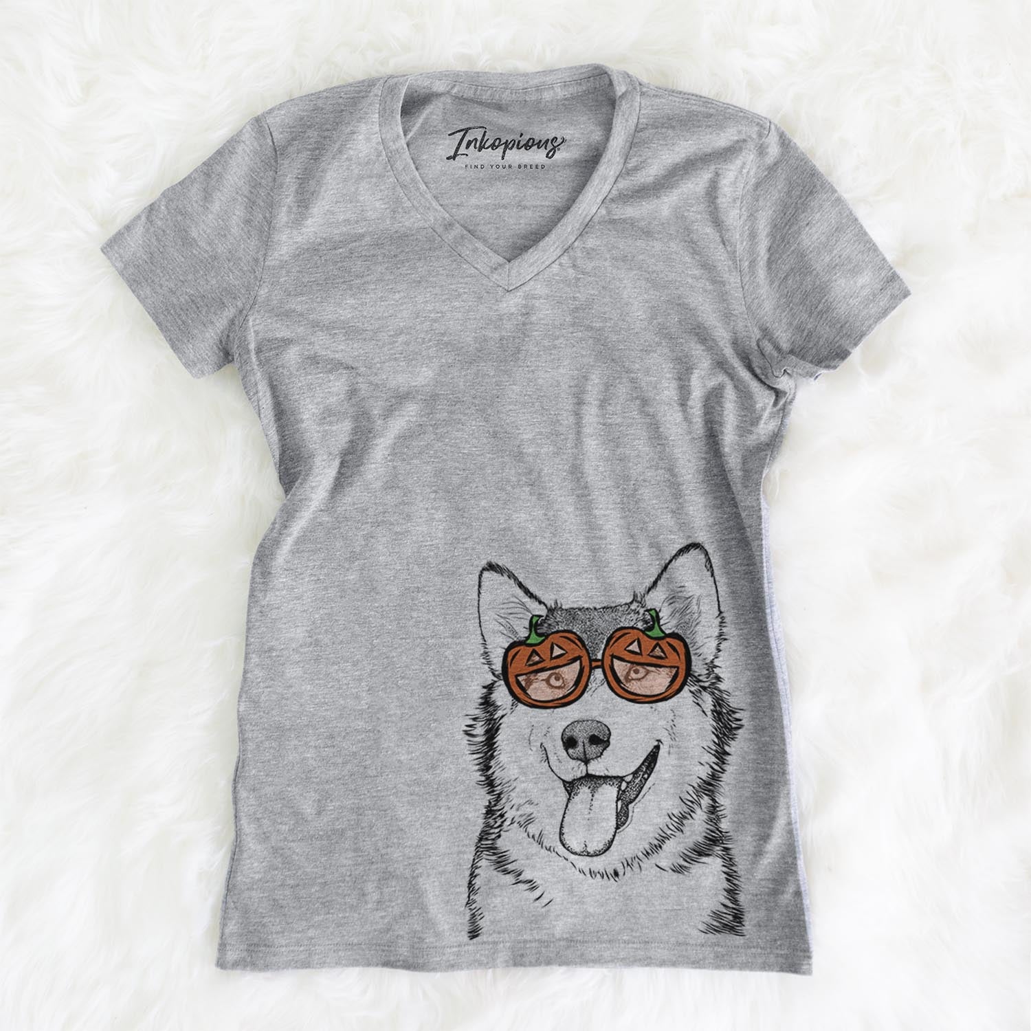 Hand-drawn sketch of Kaskae the Malamute wearing pumpkin glasses on a Grey pumpkin collection, on a hanger