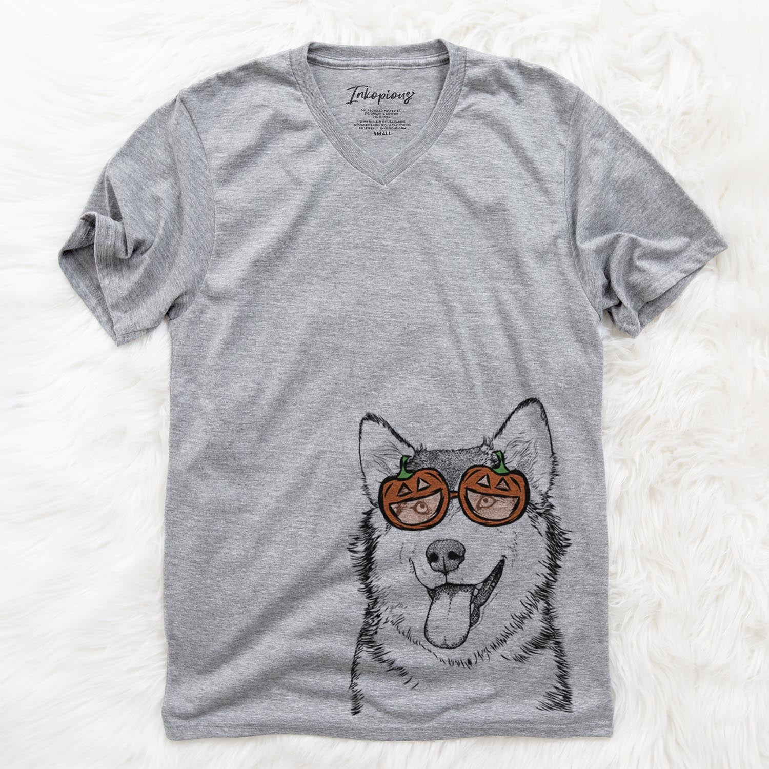 Hand-drawn sketch of Kaskae the Malamute wearing pumpkin glasses on a Grey pumpkin collection