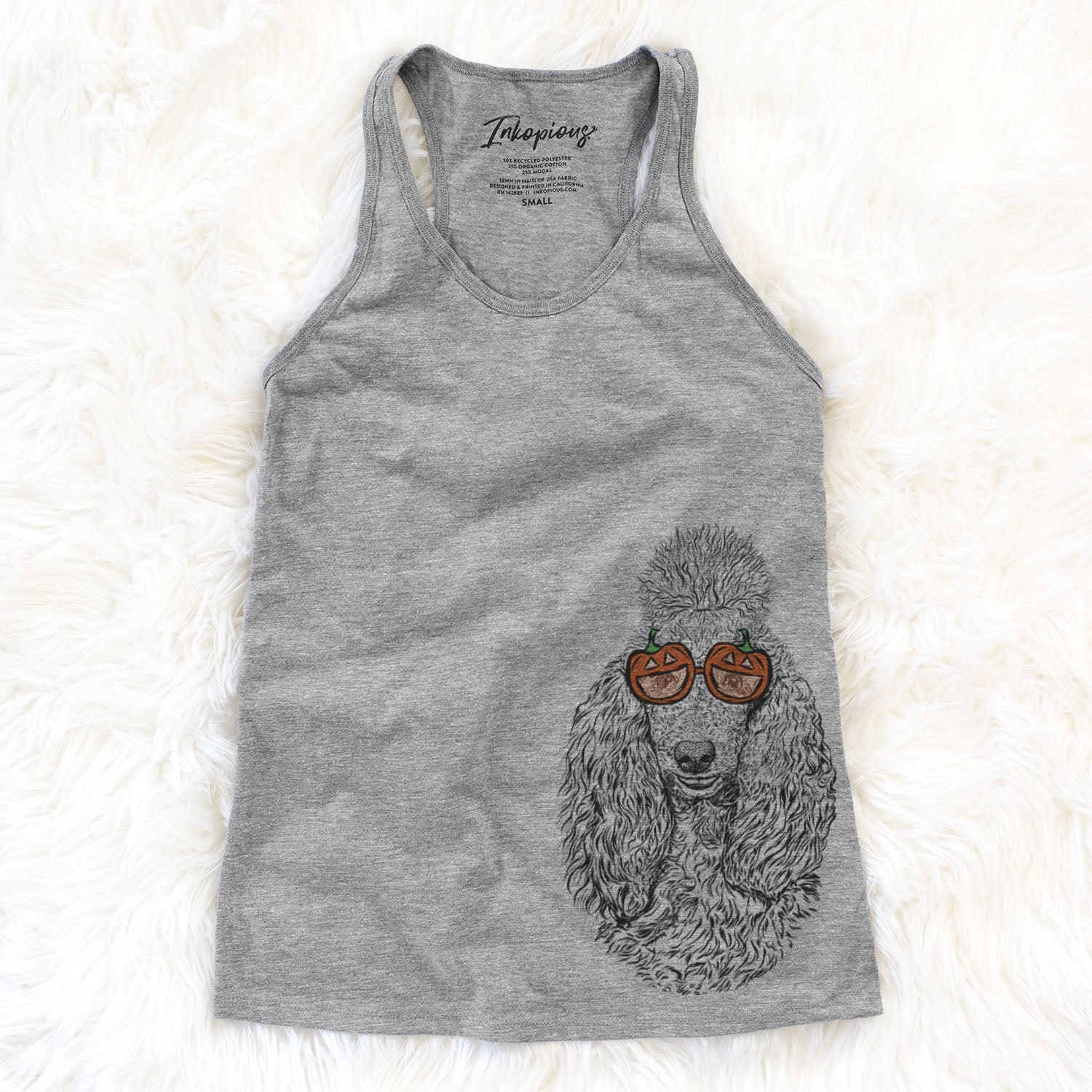 Hand-drawn sketch of Kenna the Poodle wearing pumpkin glasses on a Grey pumpkin collection
