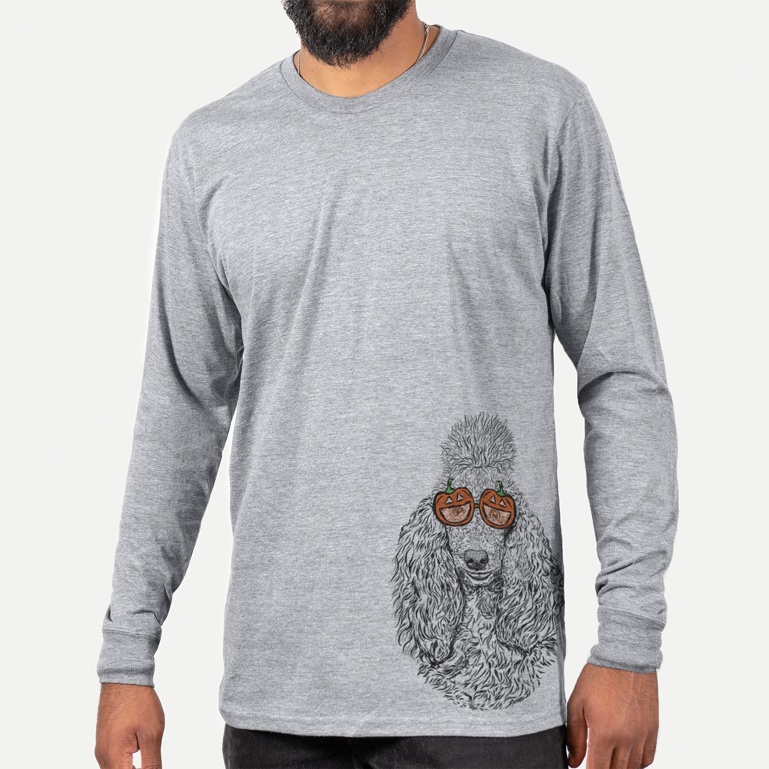 Hand-drawn sketch of Kenna the Poodle wearing pumpkin glasses on a Grey pumpkin collection, hanging on a wall