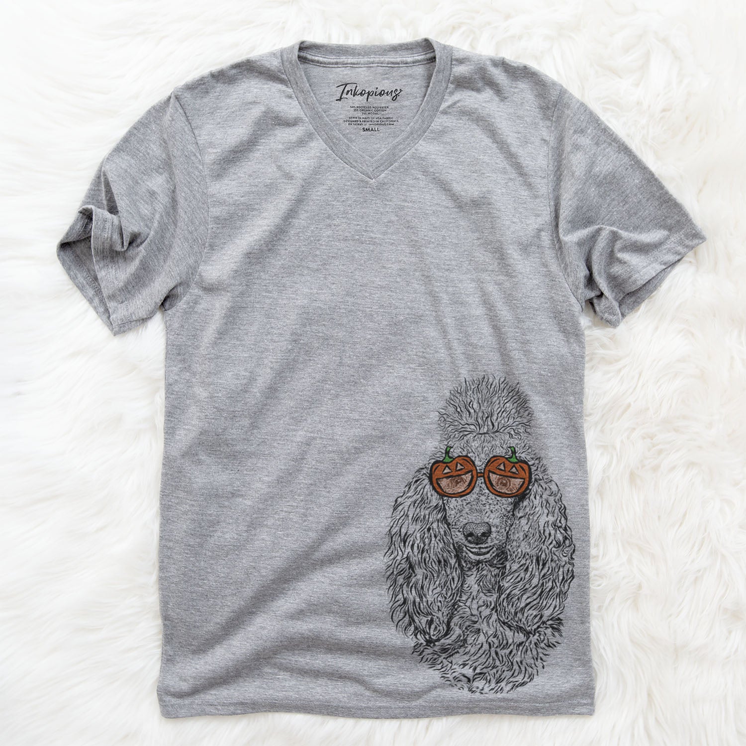 Hand-drawn sketch of Kenna the Poodle wearing pumpkin glasses on a Grey pumpkin collection