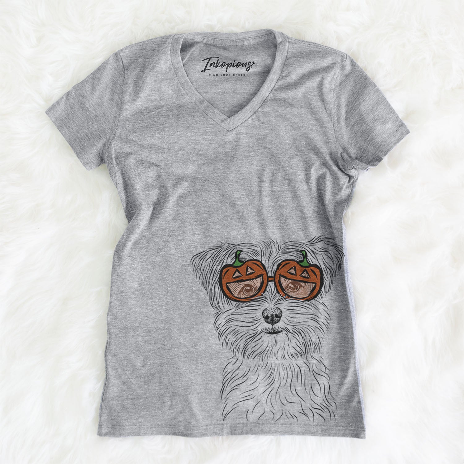 Hand-drawn sketch of Kiwi the Morkie wearing pumpkin glasses on a Grey pumpkin collection, on a hanger
