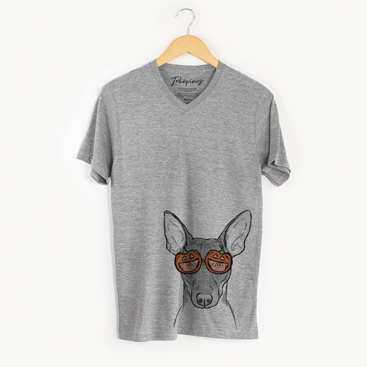 Hand-drawn sketch of Knox the Rat Terrier wearing pumpkin glasses on a Grey pumpkin collection