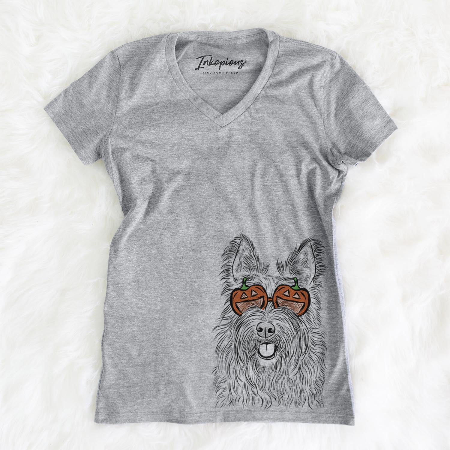 Hand-drawn sketch of Kyros the Berger Picard wearing pumpkin glasses on a Grey pumpkin collection, on a hanger