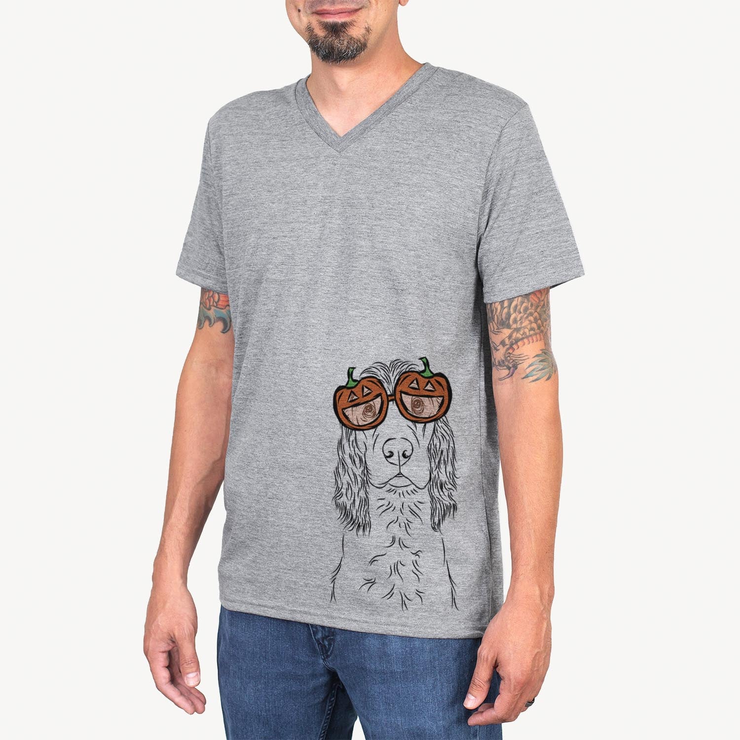 Hand-drawn sketch of Logan the Cocker Spaniel wearing pumpkin glasses on a Grey pumpkin collection