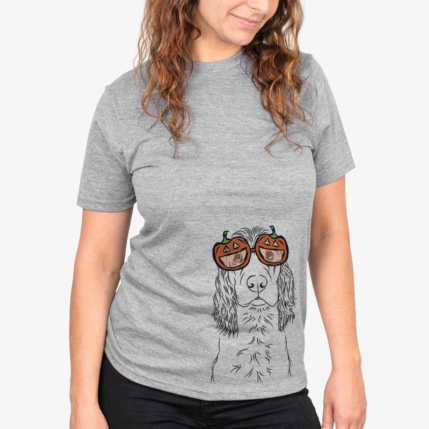 Hand-drawn sketch of Logan the Cocker Spaniel wearing pumpkin glasses on a Grey pumpkin collection, on a hanger