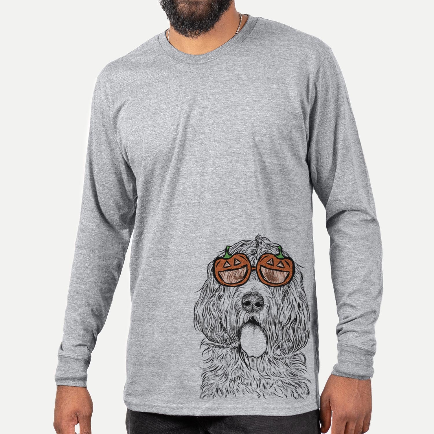 Hand-drawn sketch of Lou the Otterhound wearing pumpkin glasses on a Grey pumpkin collection, hanging on a wall