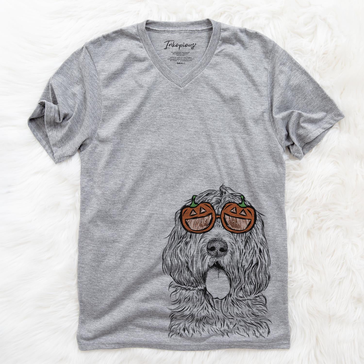 Hand-drawn sketch of Lou the Otterhound wearing pumpkin glasses on a Grey pumpkin collection