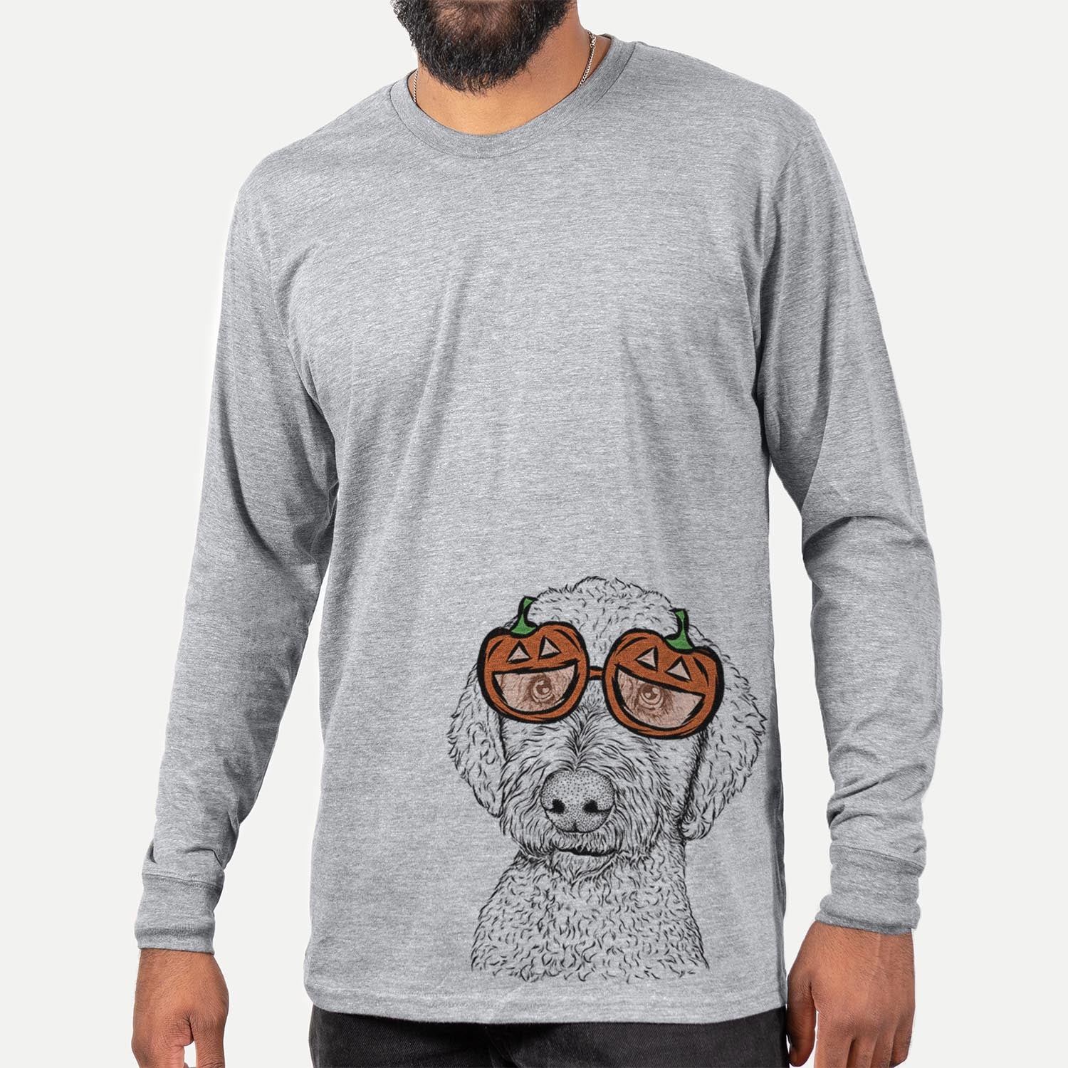 Hand-drawn sketch of Lucy Boo the Goldendoodle wearing pumpkin glasses on a Grey pumpkin collection, hanging on a wall