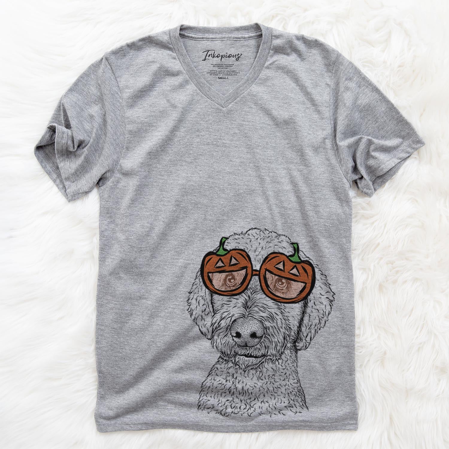 Hand-drawn sketch of Lucy Boo the Goldendoodle wearing pumpkin glasses on a Grey pumpkin collection