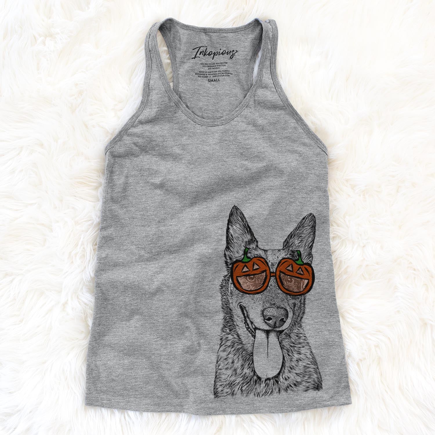 Hand-drawn sketch of Madison the Blue Heeler wearing pumpkin glasses on a Grey pumpkin collection