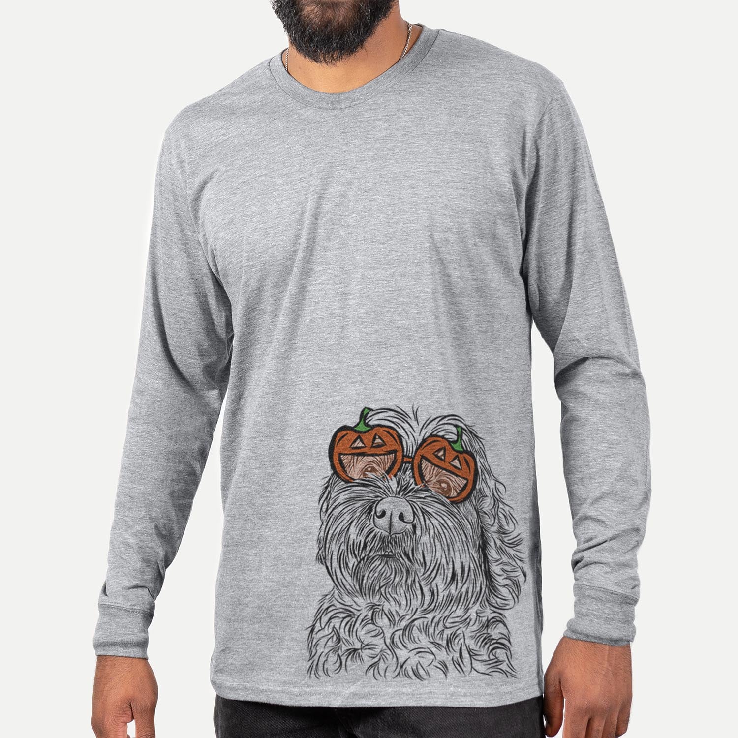 Hand-drawn sketch of Maggie Girl the Cockapoo wearing pumpkin glasses on a Grey pumpkin collection, hanging on a wall