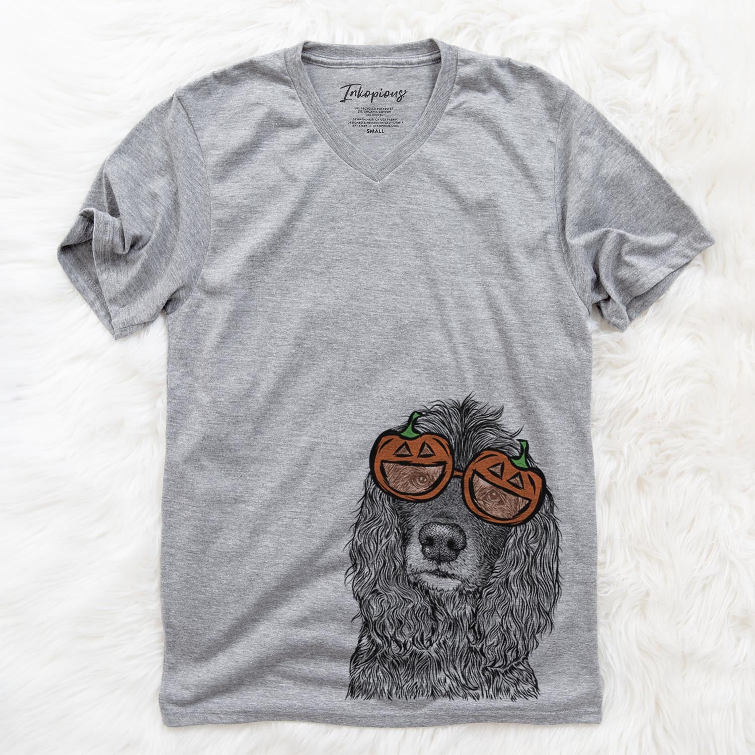Hand-drawn sketch of Marley Boy the American Cocker Spaniel wearing pumpkin glasses on a Grey pumpkin collection