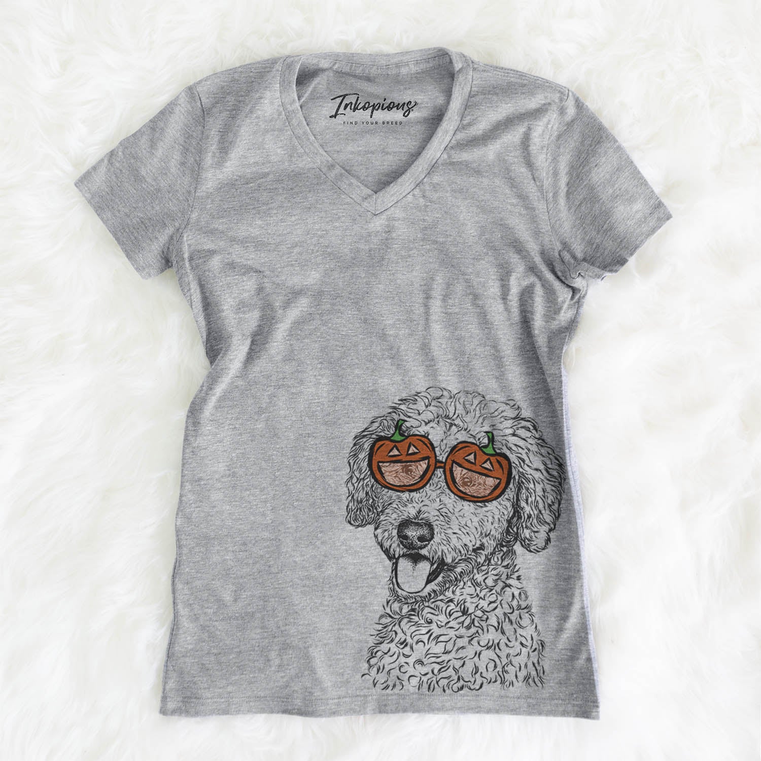 Hand-drawn sketch of Marlow the Goldendoodle wearing pumpkin glasses on a Marlow Doodle pumpkin collection, on a hanger