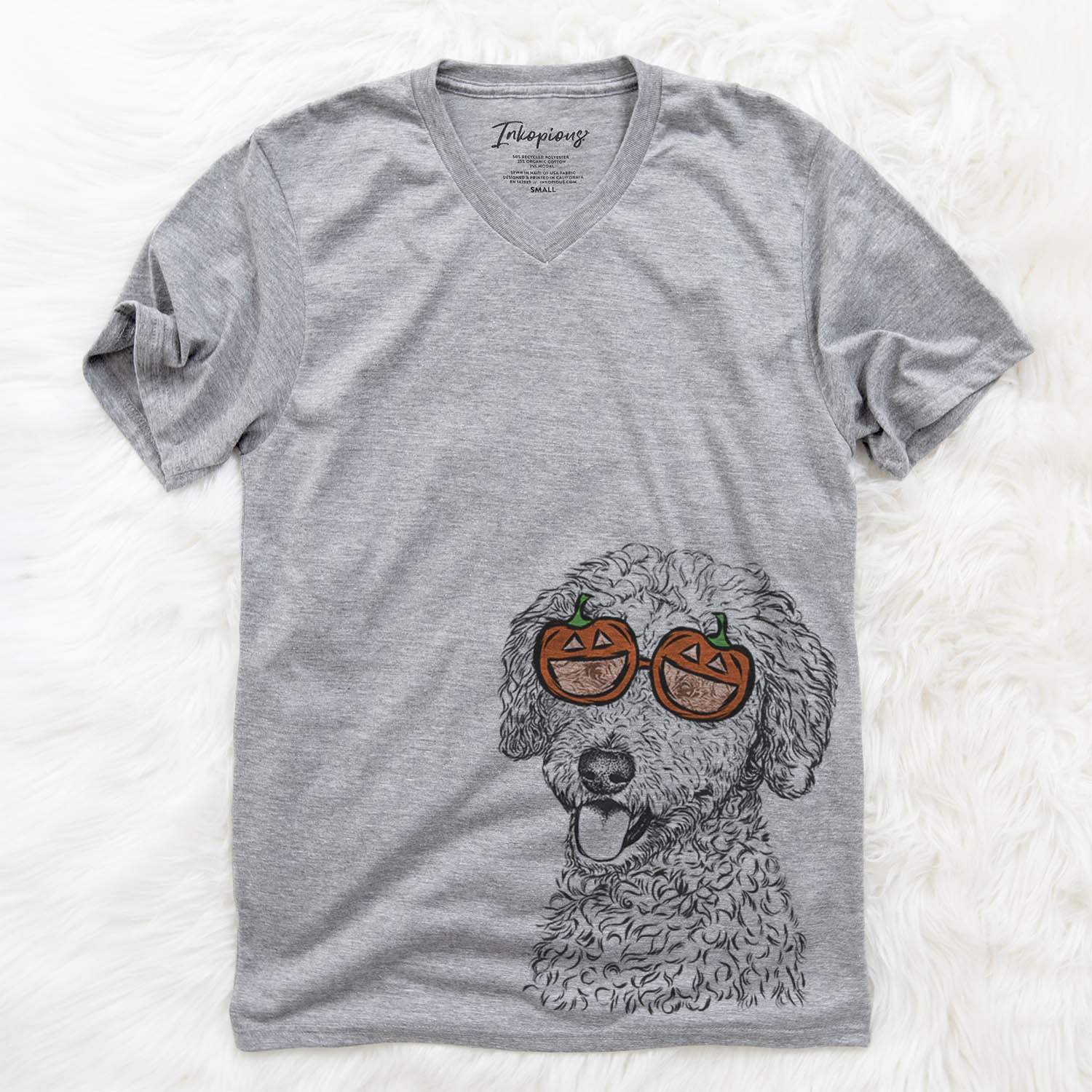 Hand-drawn sketch of Marlow the Goldendoodle wearing pumpkin glasses on a Marlow Doodle pumpkin collection