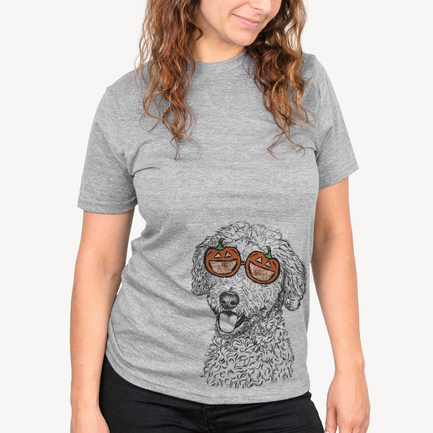 Hand-drawn sketch of Marlow the Goldendoodle wearing pumpkin glasses on a Marlow Doodle pumpkin collection, on a hanger