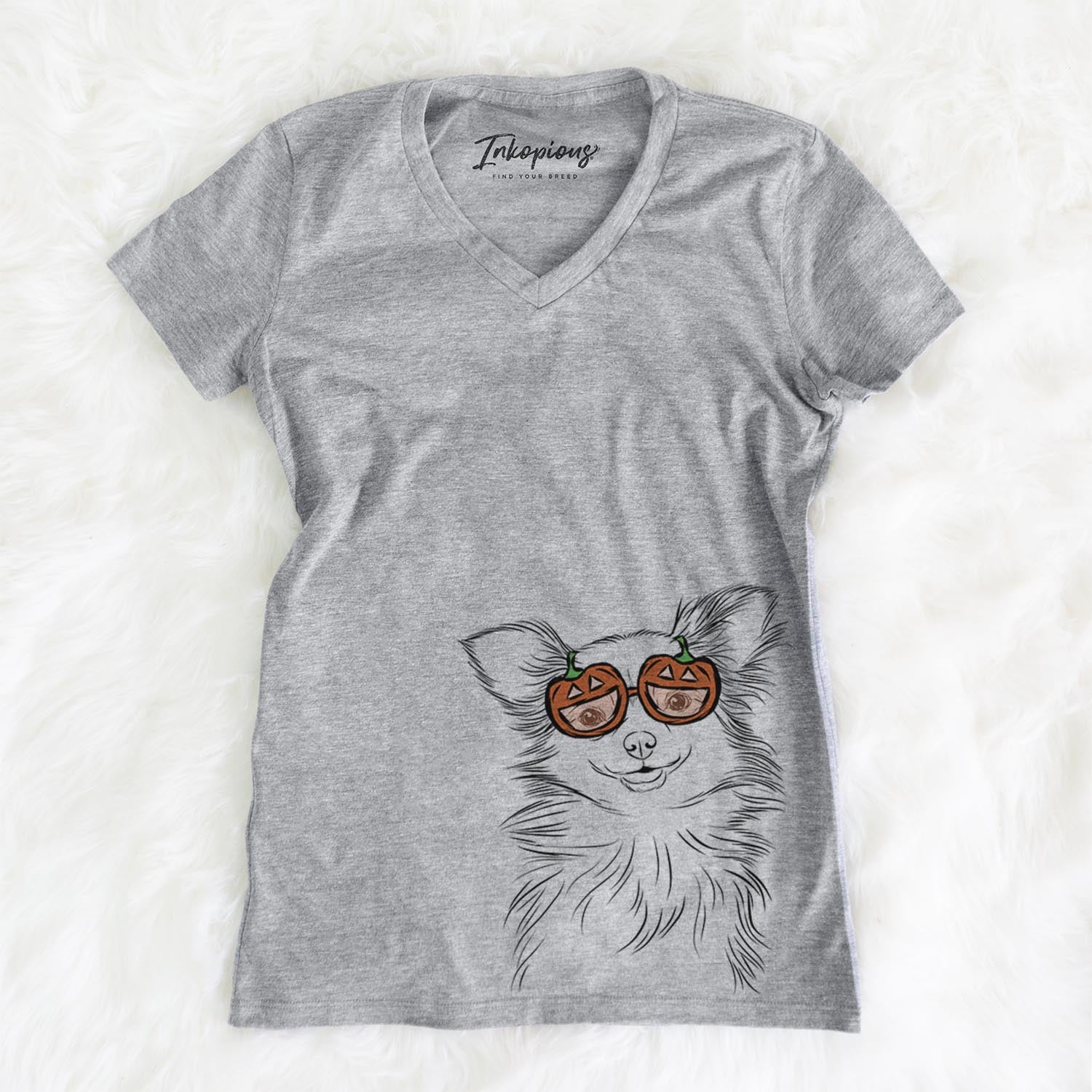 Hand-drawn sketch of Marzi the Long Haired Chihuahua wearing pumpkin glasses on a Grey pumpkin collection, on a hanger