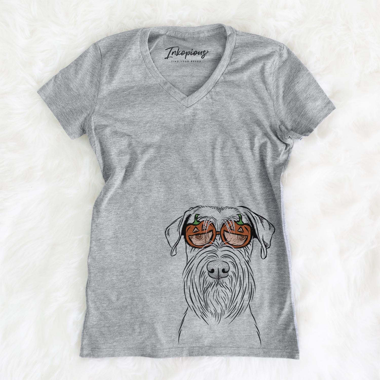 Hand-drawn sketch of Milton the Standard Schnauzer wearing pumpkin glasses on a Grey pumpkin collection, on a hanger