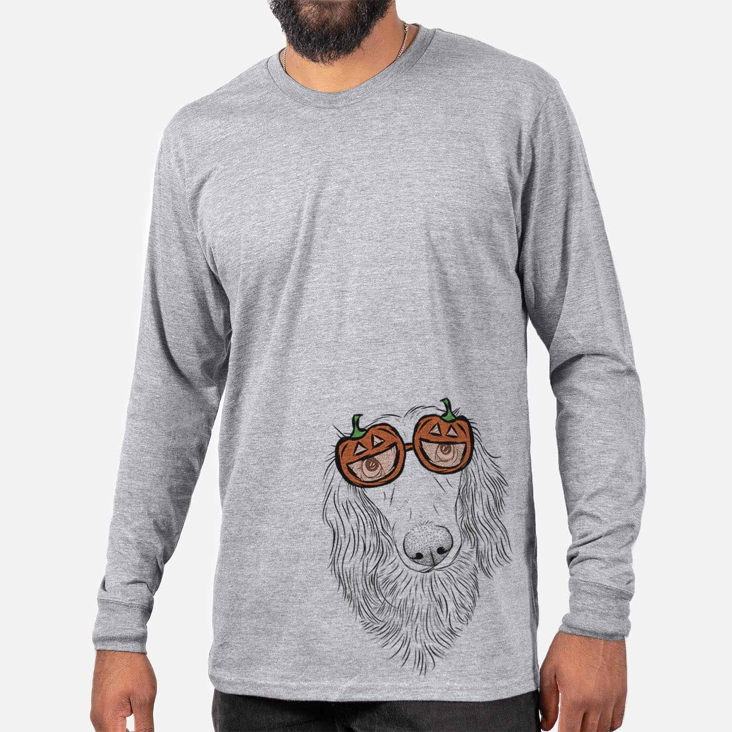 Hand-drawn sketch of Mr. Rusty the Long Haired Dachshund wearing pumpkin glasses on a Mr Rusty pumpkin collection, hanging on a wall