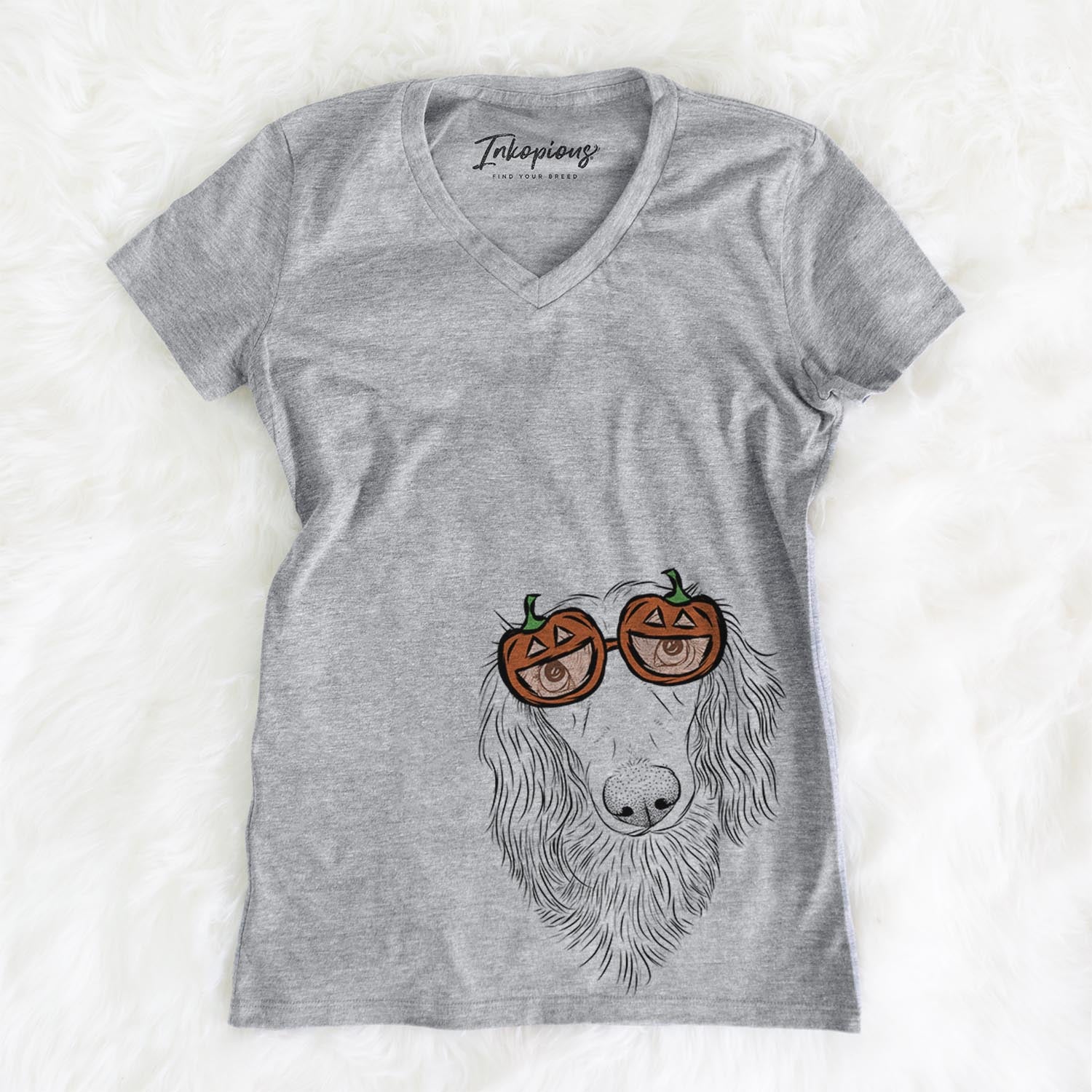 Hand-drawn sketch of Mr. Rusty the Long Haired Dachshund wearing pumpkin glasses on a Mr Rusty pumpkin collection, on a hanger