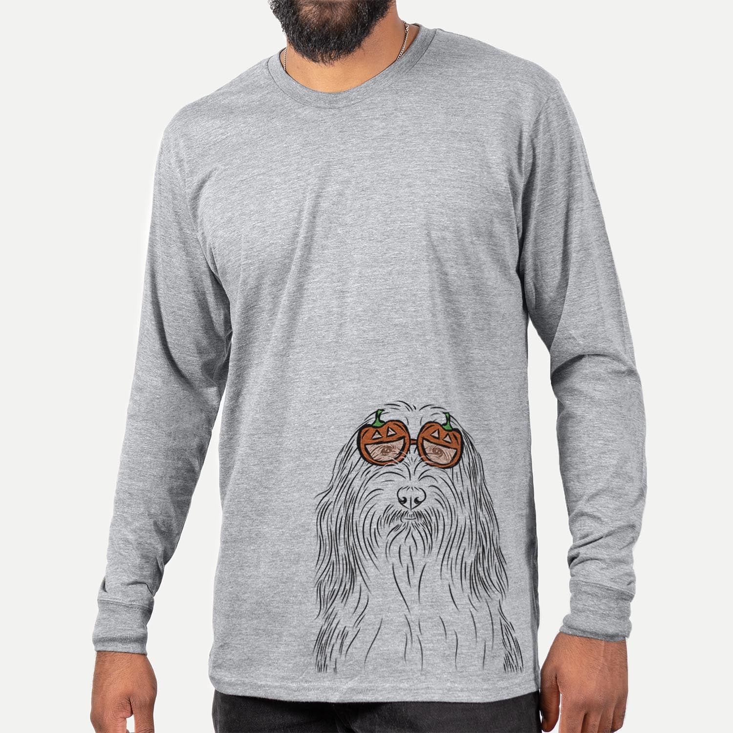 Hand-drawn sketch of Murray the Bearded Collie wearing pumpkin glasses on a Grey pumpkin collection, hanging on a wall