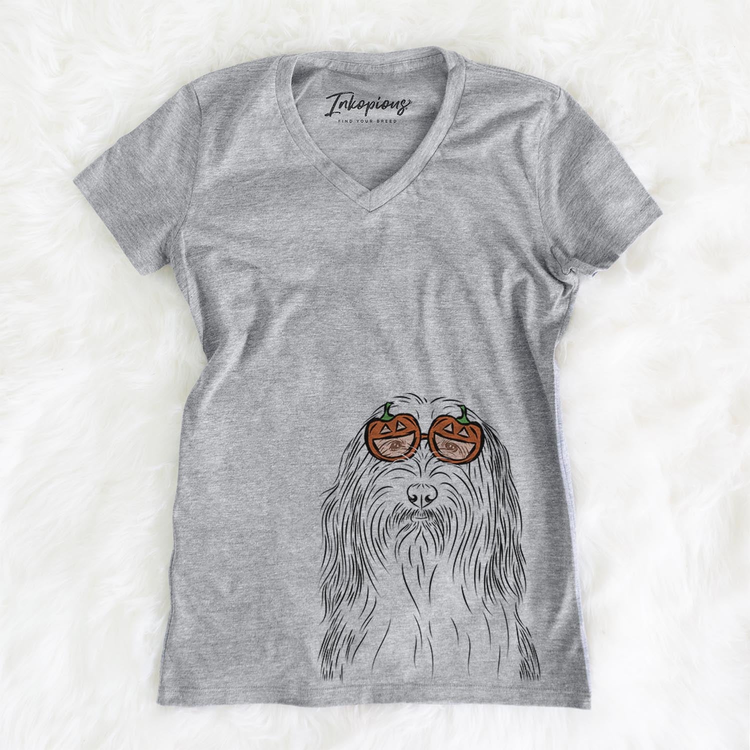 Hand-drawn sketch of Murray the Bearded Collie wearing pumpkin glasses on a Grey pumpkin collection, on a hanger