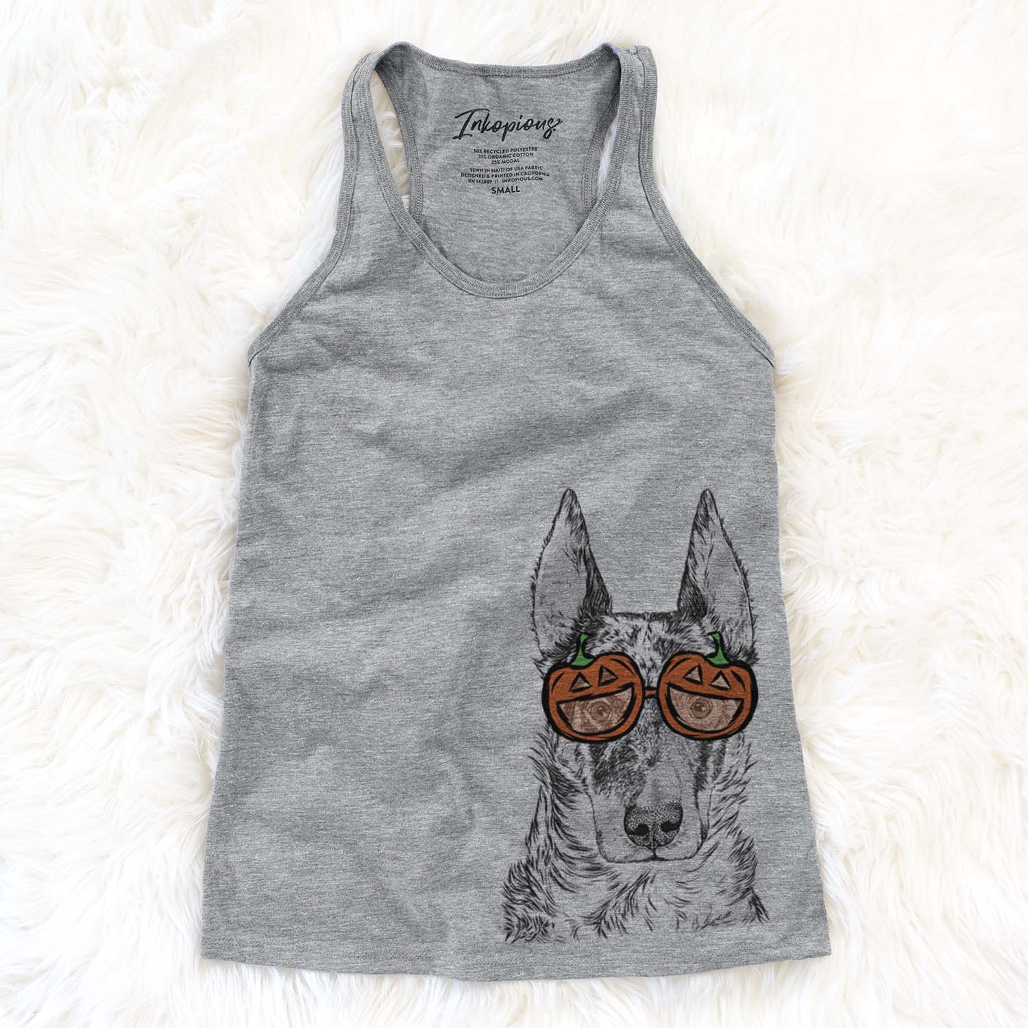 Hand-drawn sketch of Nori the Beauceron wearing pumpkin glasses on a Grey pumpkin collection