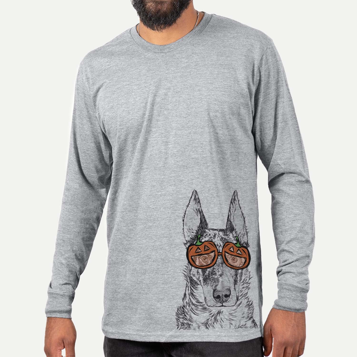 Hand-drawn sketch of Nori the Beauceron wearing pumpkin glasses on a Grey pumpkin collection, hanging on a wall