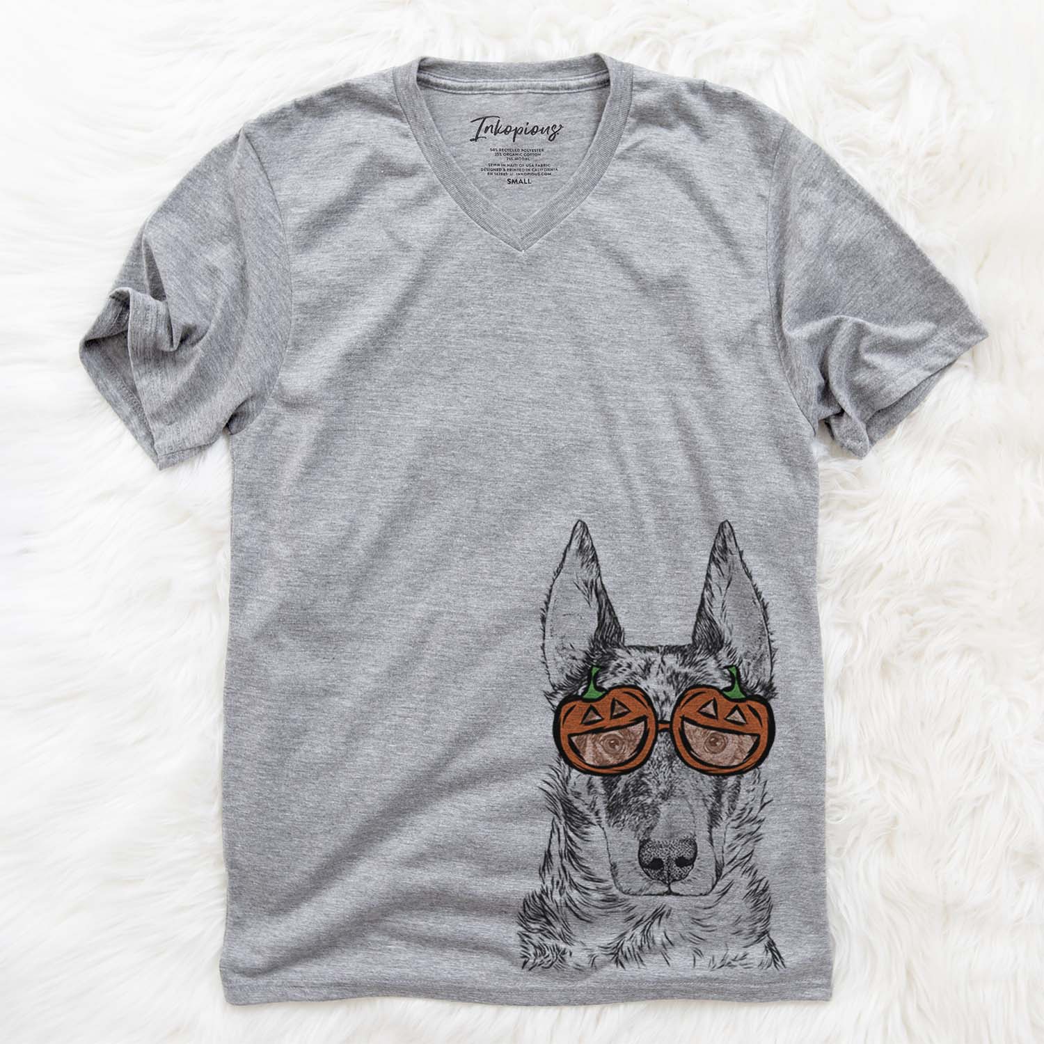 Hand-drawn sketch of Nori the Beauceron wearing pumpkin glasses on a Grey pumpkin collection