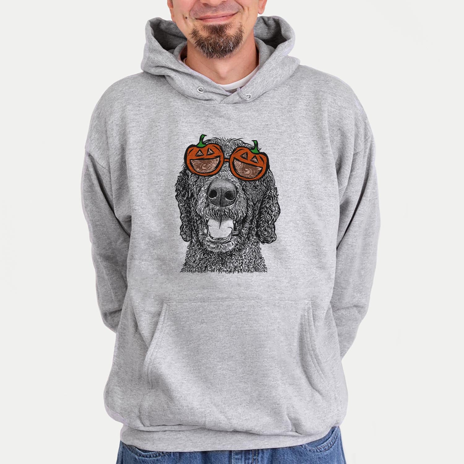 Hand-drawn sketch of Obi James the Goldendoodle wearing pumpkin glasses on a Grey pumpkin collection, hanging on a wall