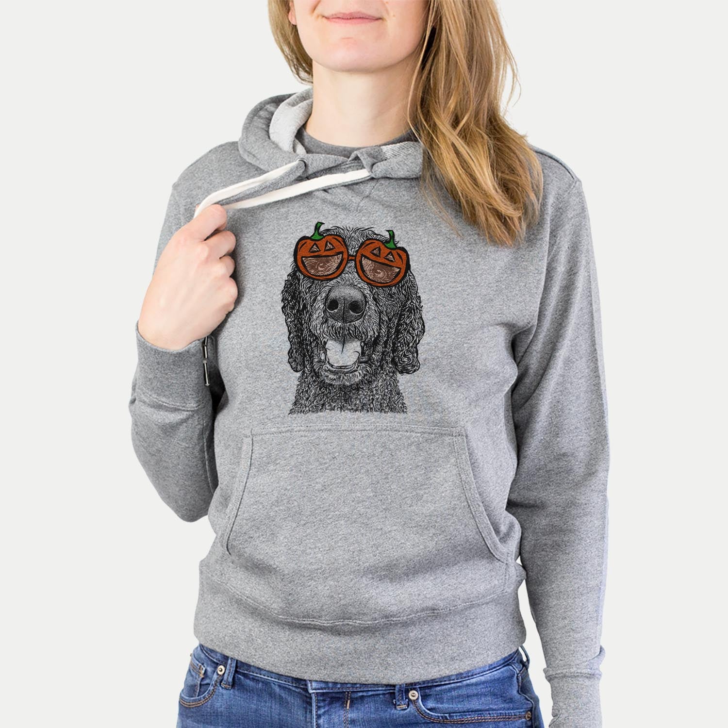 Hand-drawn sketch of Obi James the Goldendoodle wearing pumpkin glasses on a Grey pumpkin collection, hanging on a wall