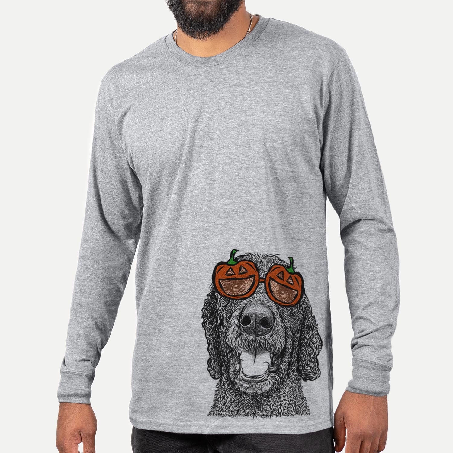 Hand-drawn sketch of Obi James the Goldendoodle wearing pumpkin glasses on a Grey pumpkin collection, hanging on a wall