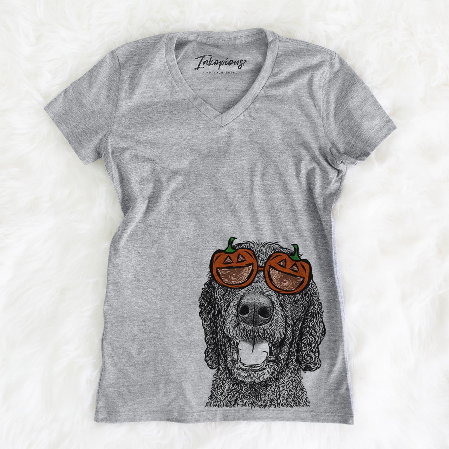 Hand-drawn sketch of Obi James the Goldendoodle wearing pumpkin glasses on a Grey pumpkin collection, on a hanger