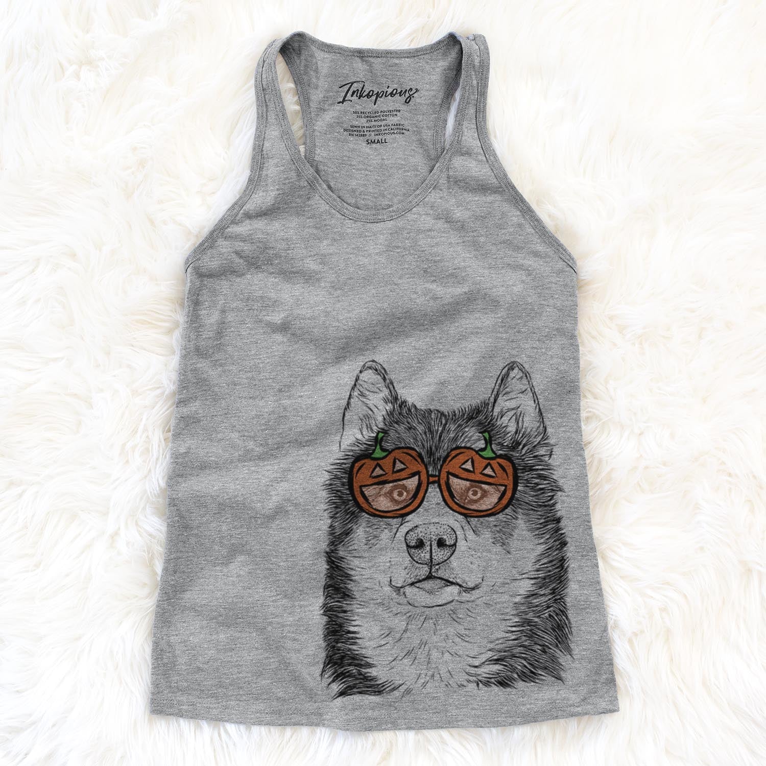 Hand-drawn sketch of Oskar the Candian Eskimo Dog wearing pumpkin glasses on a Grey pumpkin collection