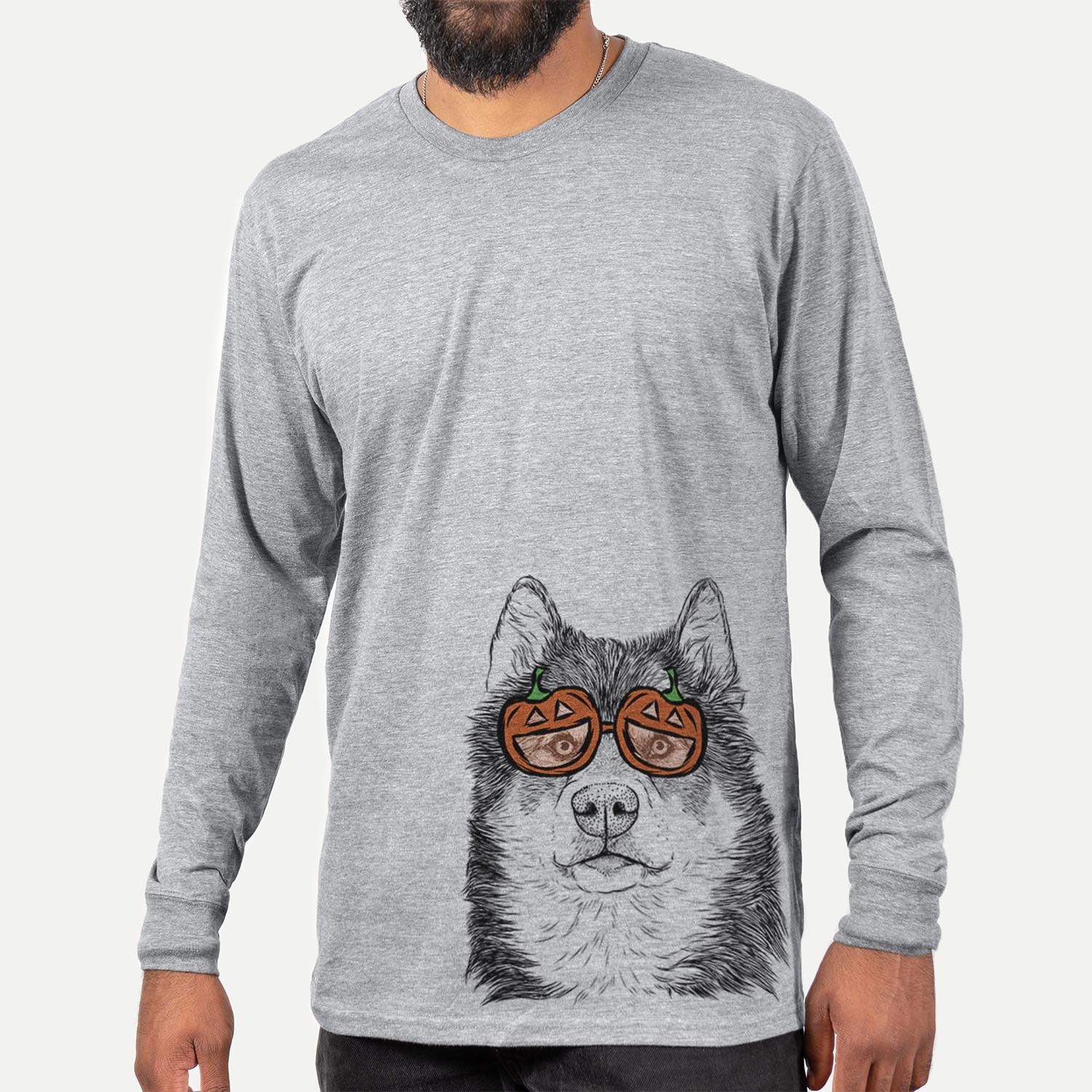 Hand-drawn sketch of Oskar the Candian Eskimo Dog wearing pumpkin glasses on a Grey pumpkin collection, hanging on a wall