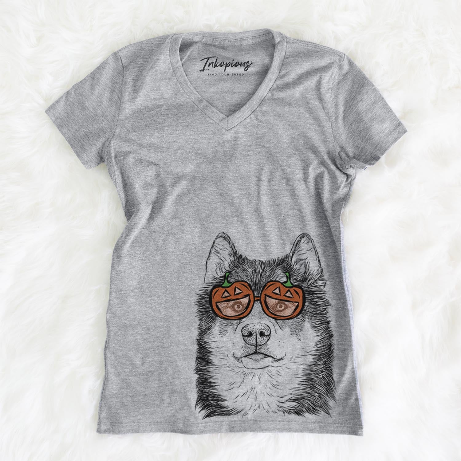 Hand-drawn sketch of Oskar the Candian Eskimo Dog wearing pumpkin glasses on a Grey pumpkin collection, on a hanger